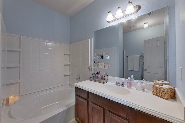 bathroom featuring vanity and shower / bathing tub combination