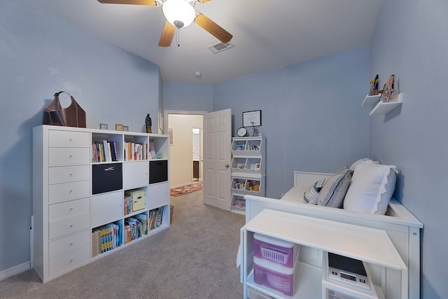 interior space with ceiling fan