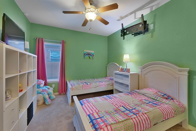 bedroom featuring ceiling fan and light colored carpet