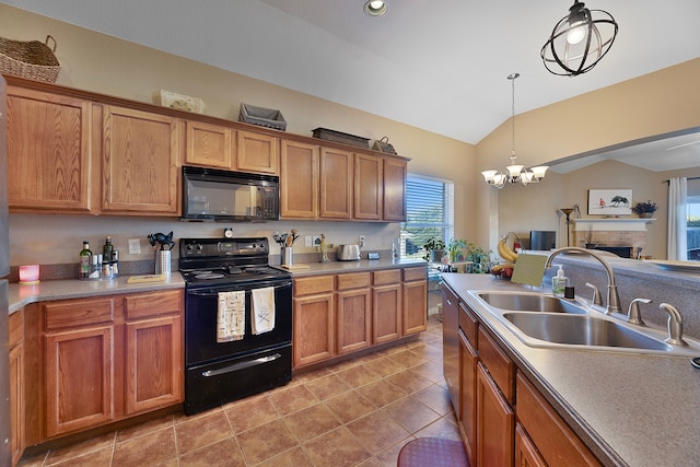 kitchen with decorative light fixtures, lofted ceiling, sink, tile patterned flooring, and black appliances