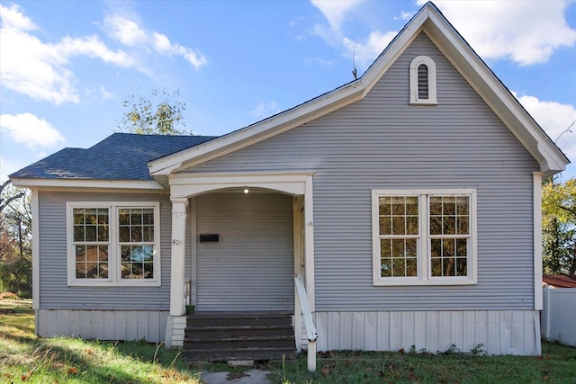 view of front of house featuring roof with shingles