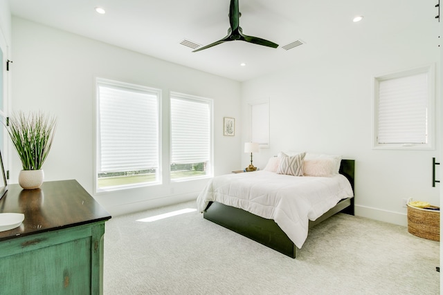 carpeted bedroom featuring ceiling fan