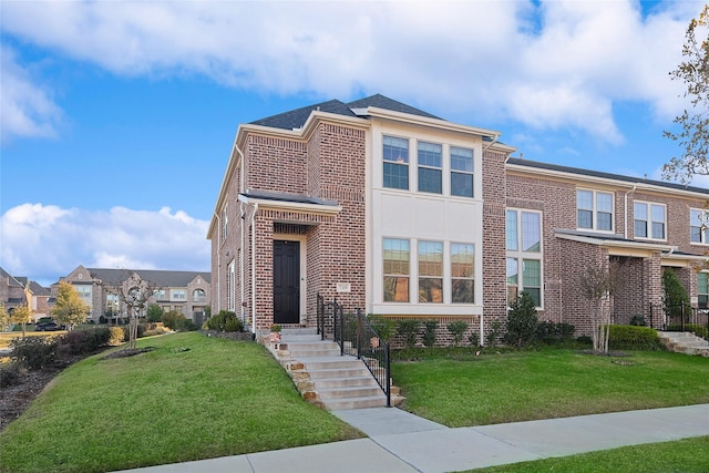 view of front of home with a front yard