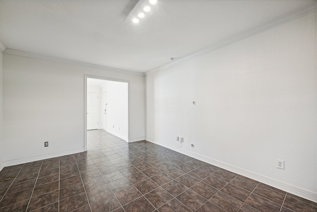 unfurnished room featuring crown molding