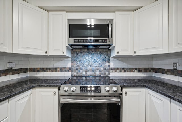 kitchen with white cabinets and appliances with stainless steel finishes