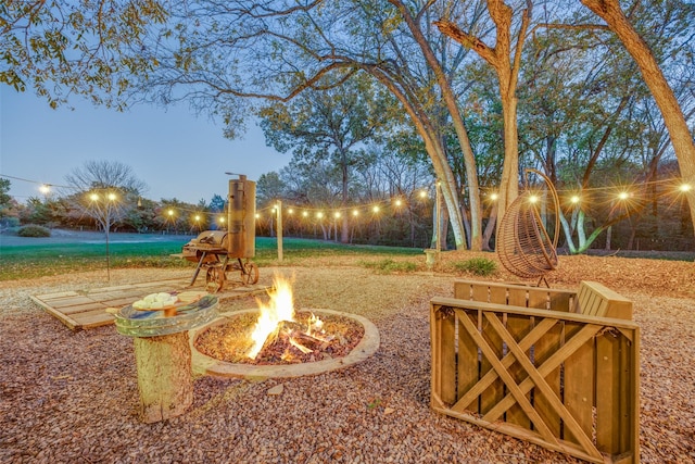 1347 Wild Rd, Van Alstyne, TX 75495 - view of yard featuring a fire pit