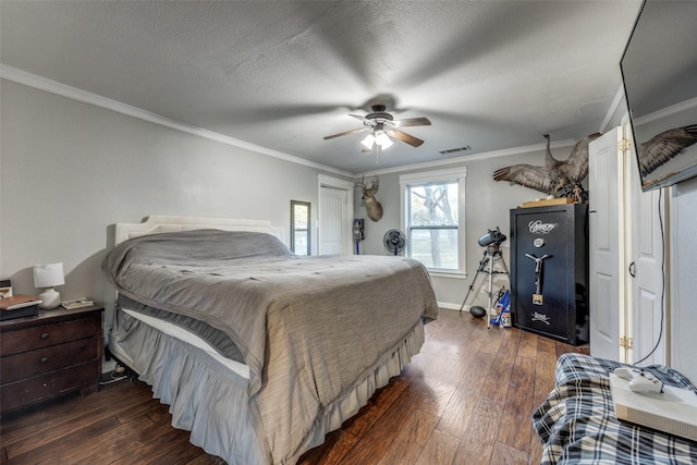 1347 Wild Rd, Van Alstyne, TX 75495 - bedroom featuring hardwood / wood-style flooring, ornamental molding, and ceiling fan