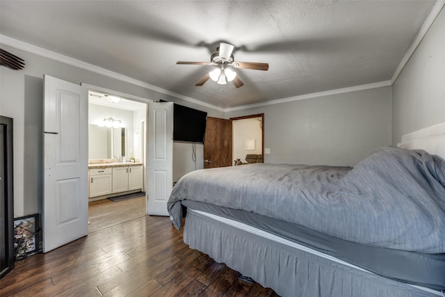 1347 Wild Rd, Van Alstyne, TX 75495 - bedroom featuring hardwood / wood-style floors, crown molding, connected bathroom, and ceiling fan