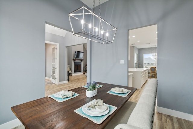 dining area featuring light wood-type flooring