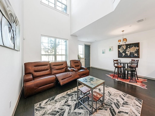 living room featuring dark hardwood / wood-style flooring