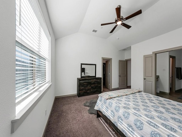 bedroom featuring dark colored carpet, ceiling fan, a closet, and vaulted ceiling