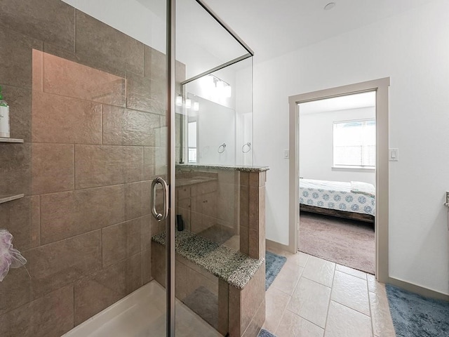 bathroom featuring tile patterned floors and walk in shower