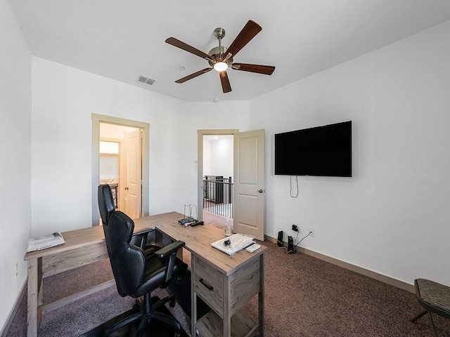 office featuring ceiling fan and carpet floors