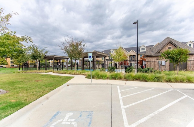 view of community featuring a lawn