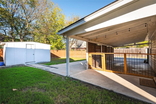 exterior space featuring a fenced backyard, a storage unit, a patio, and an outdoor structure