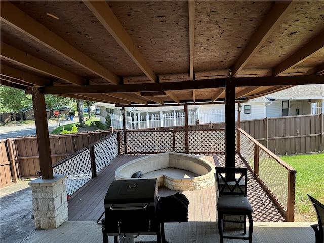 wooden deck with grilling area