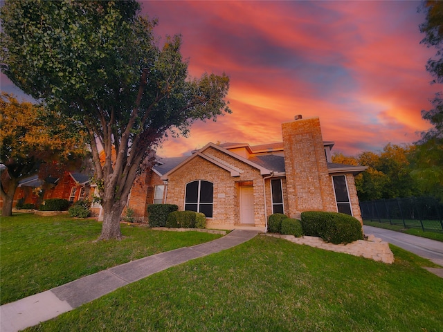 view of property with a front lawn