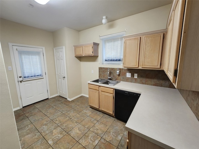 kitchen with decorative backsplash, light brown cabinets, black dishwasher, and sink