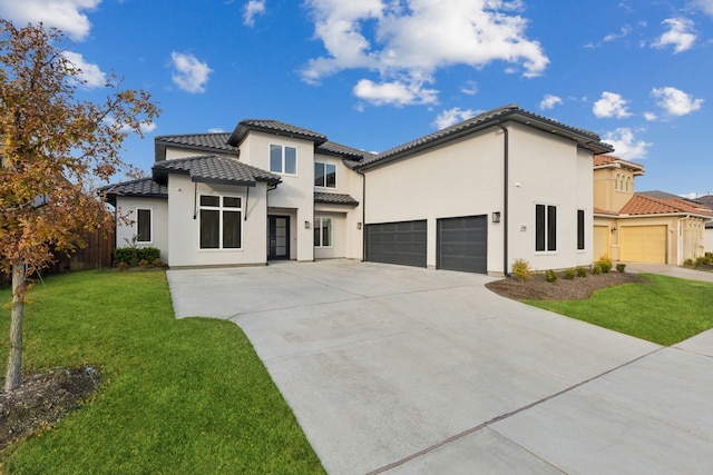 mediterranean / spanish house with a front lawn