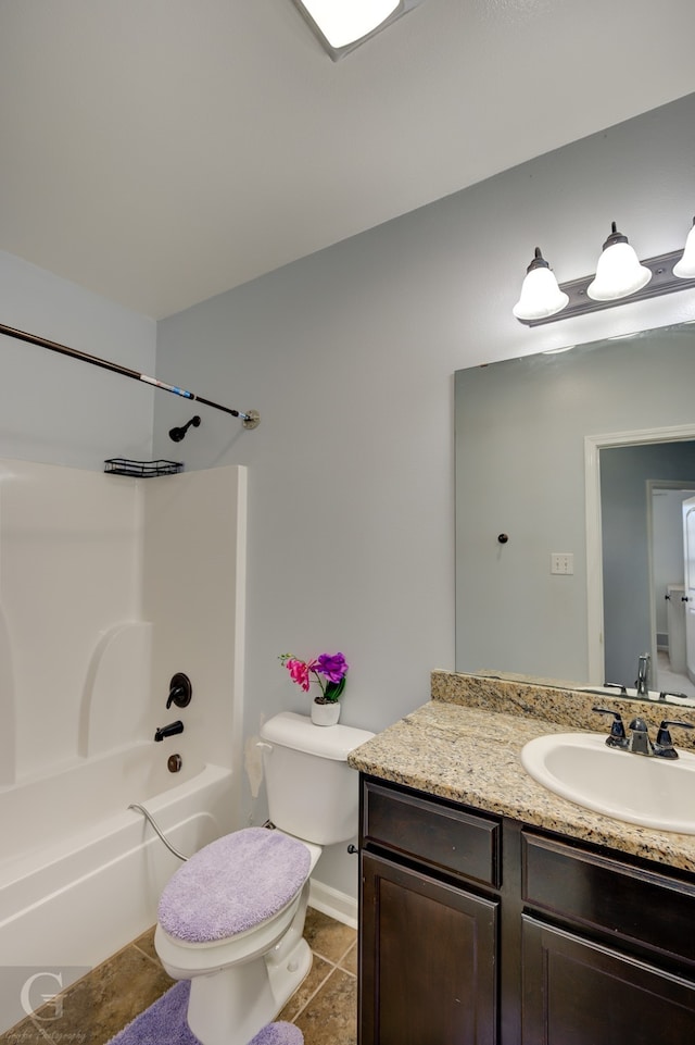 full bathroom featuring vanity, tile patterned flooring, shower / bathing tub combination, and toilet