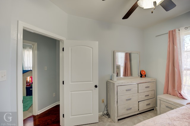 bedroom with light wood-type flooring and ceiling fan