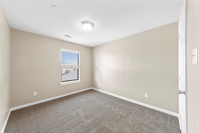 unfurnished room with carpet