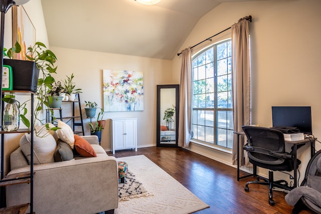 office area with dark hardwood / wood-style flooring and lofted ceiling