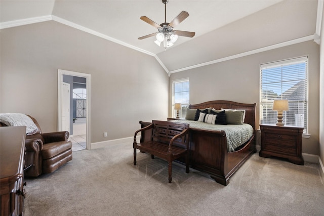 carpeted bedroom with ensuite bath, ceiling fan, vaulted ceiling, and ornamental molding