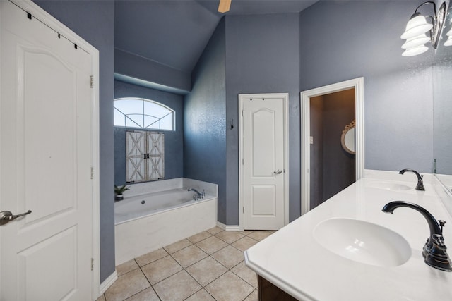 bathroom with vanity, tile patterned floors, and a bathing tub