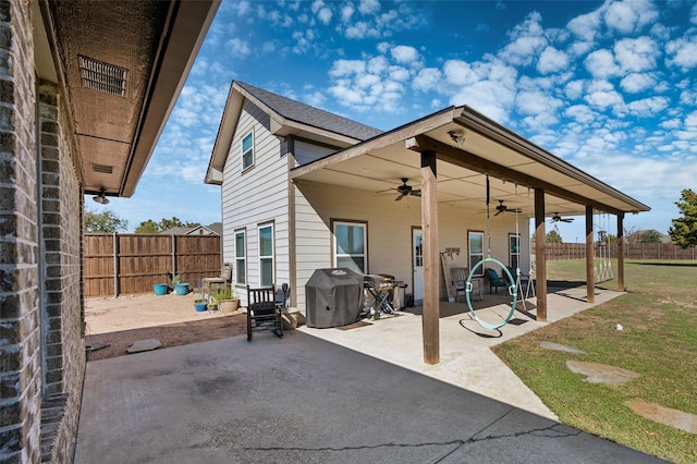 view of patio / terrace with grilling area and ceiling fan