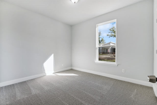 spare room with carpet flooring