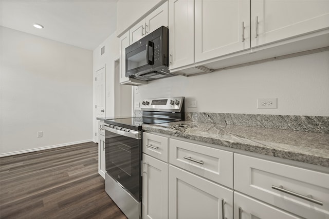 kitchen featuring white cabinets, dark hardwood / wood-style floors, light stone countertops, and electric stove