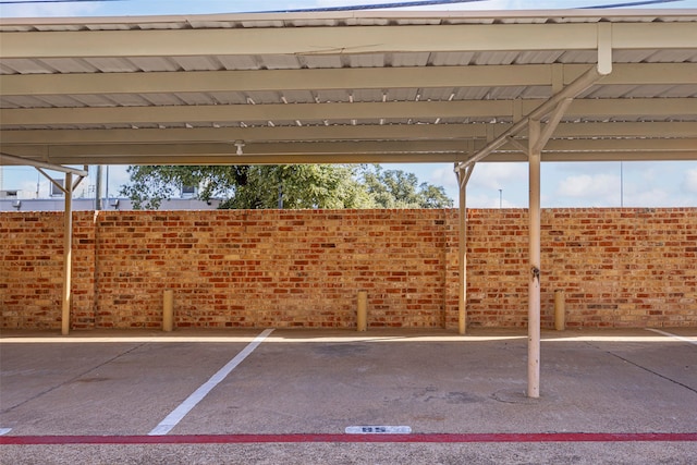 view of car parking featuring a carport