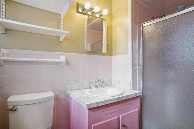 bathroom with an enclosed shower, toilet, and tile walls