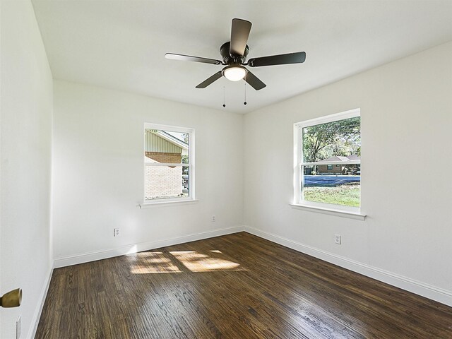 unfurnished bedroom featuring ceiling fan, a closet, and dark hardwood / wood-style floors