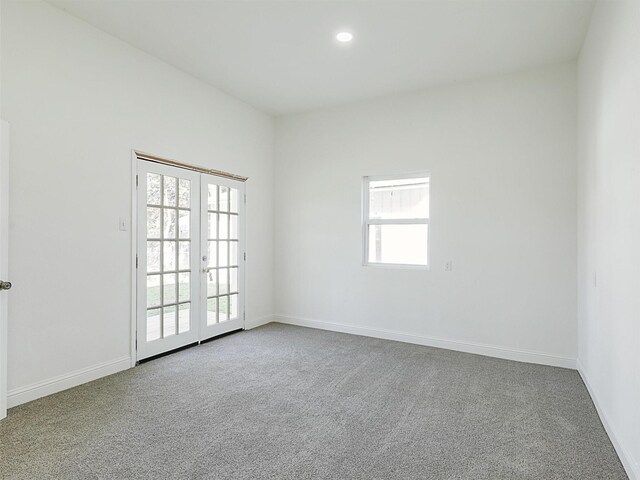 unfurnished bedroom featuring carpet flooring, connected bathroom, and sink