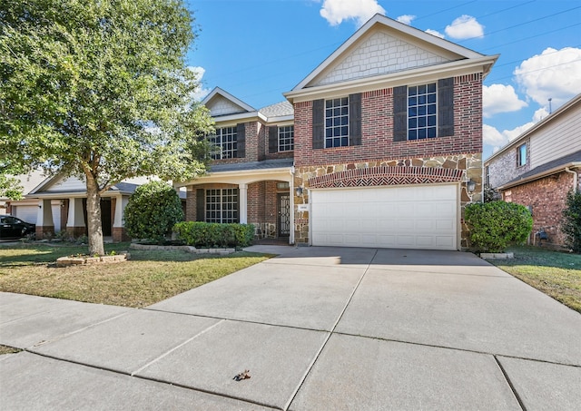 view of front of house with a front lawn and a garage