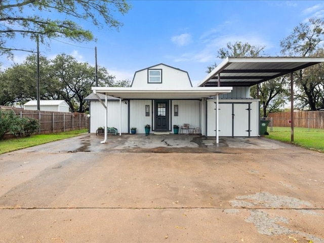 view of front of property with a carport