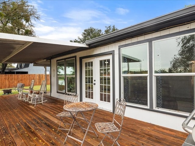 wooden terrace featuring french doors