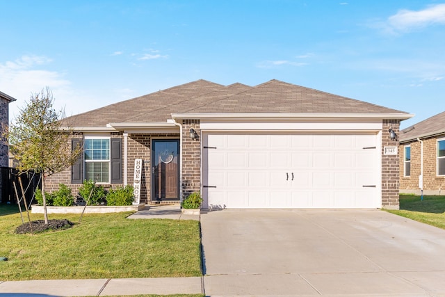 single story home featuring a front yard and a garage