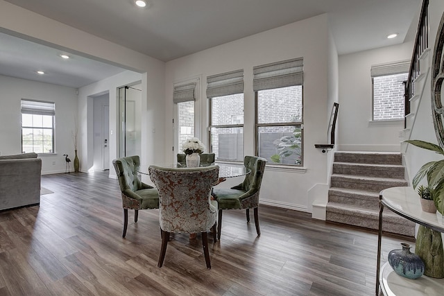 dining area featuring dark hardwood / wood-style floors