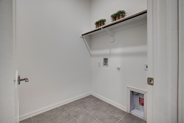 laundry area with hookup for an electric dryer, hookup for a washing machine, tile patterned flooring, and hookup for a gas dryer