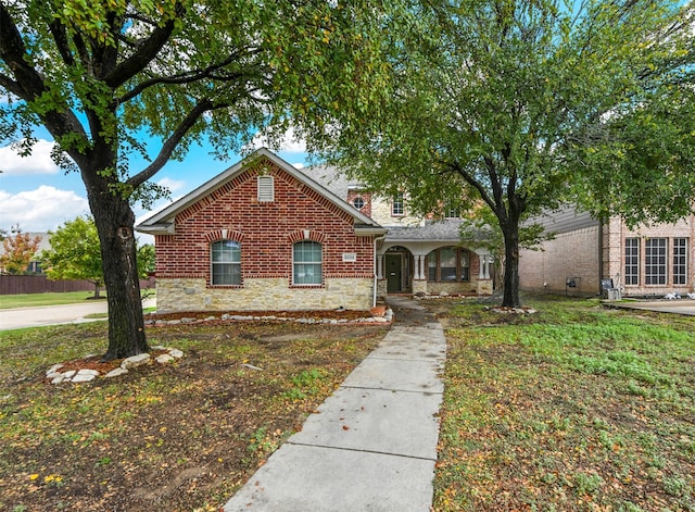 view of front of home with a front yard