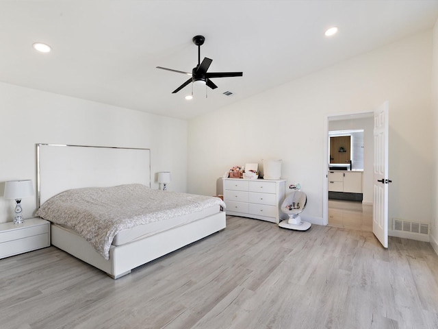 bedroom with ceiling fan and light hardwood / wood-style flooring