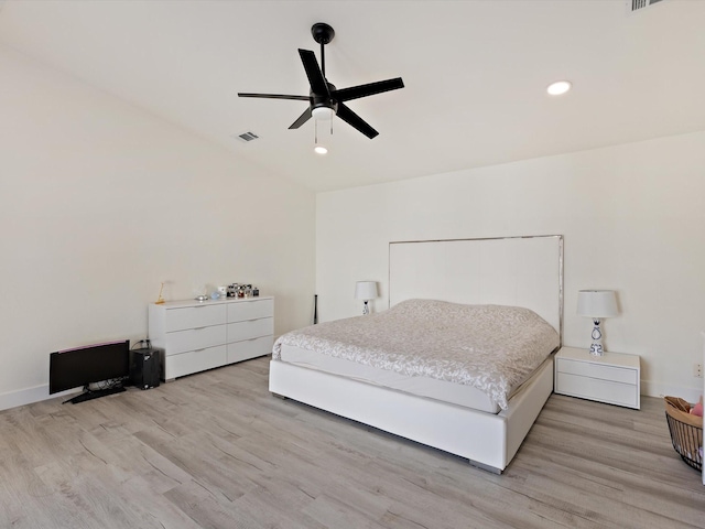 bedroom with light wood-type flooring and ceiling fan