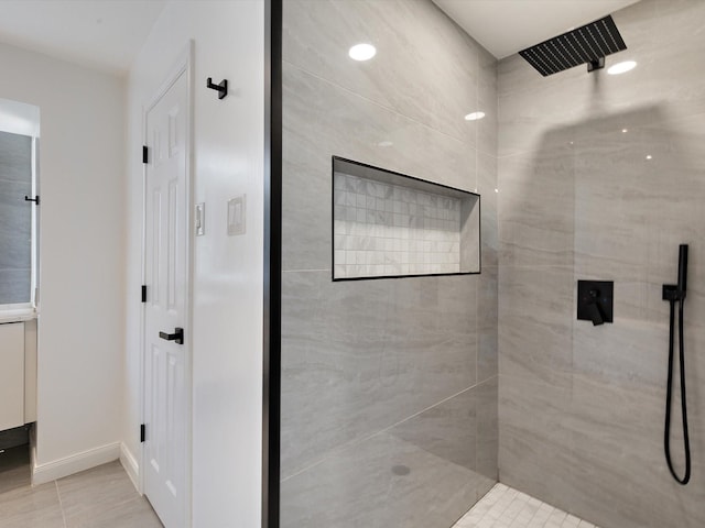 bathroom featuring tiled shower