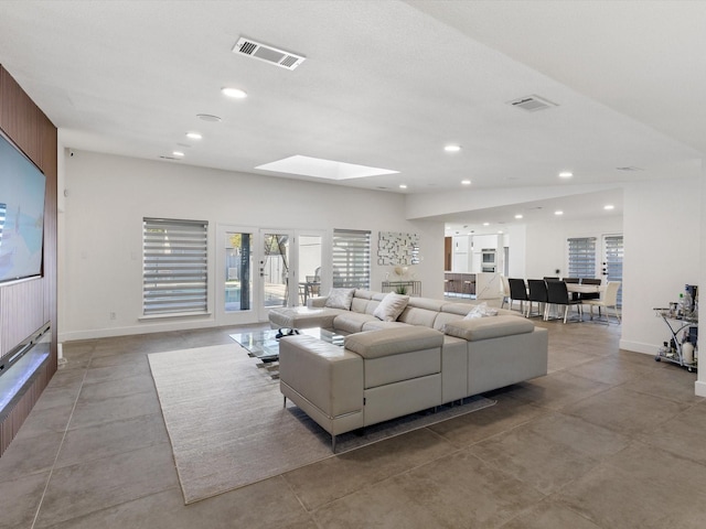 living room with a skylight