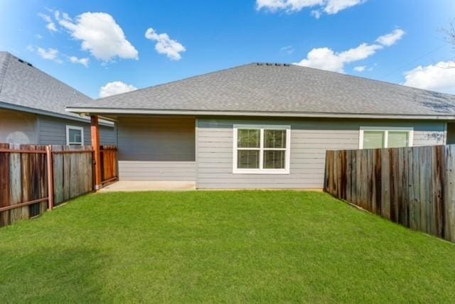 2700JAMESROAD James Rd, Granbury, TX 76049 - rear view of house with a yard