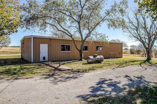 exterior space featuring an outdoor structure