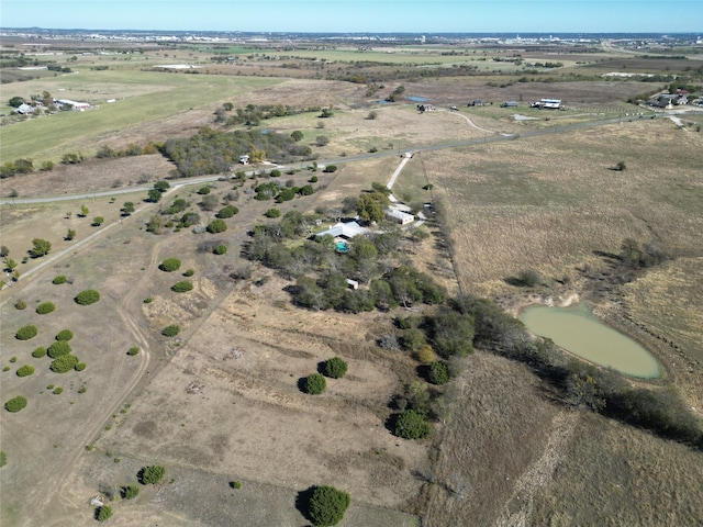 aerial view featuring a rural view and a water view